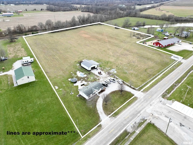 birds eye view of property featuring a rural view