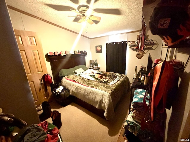 carpeted bedroom featuring lofted ceiling, a textured ceiling, ceiling fan, and crown molding