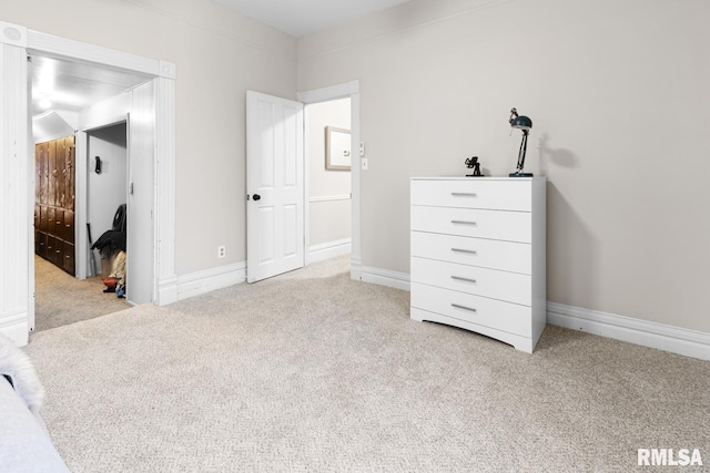 unfurnished bedroom with light carpet