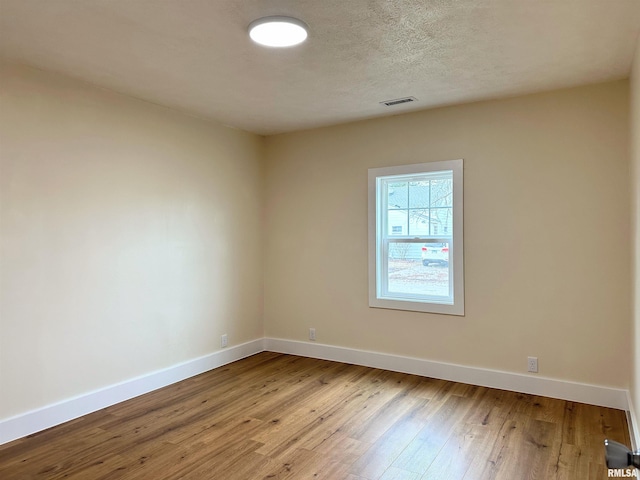 empty room featuring light hardwood / wood-style flooring