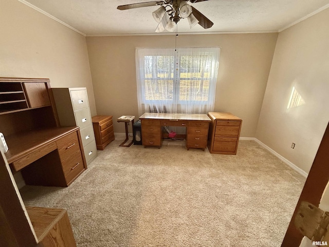 office space with ceiling fan, light colored carpet, and crown molding