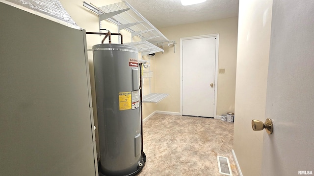 utility room featuring water heater