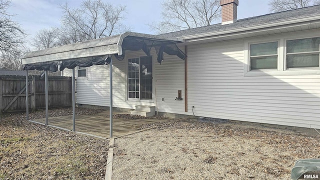 rear view of house featuring a patio