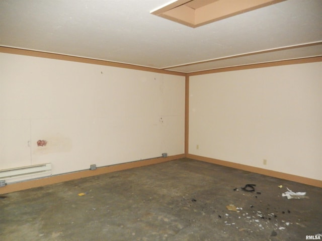 90 Oak St, Jonesboro, IL 62952 - unfurnished room with concrete floors and a baseboard radiator