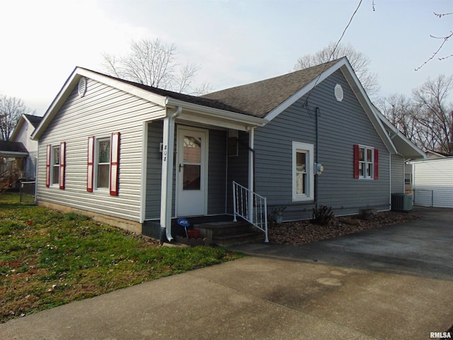 view of front of home with cooling unit