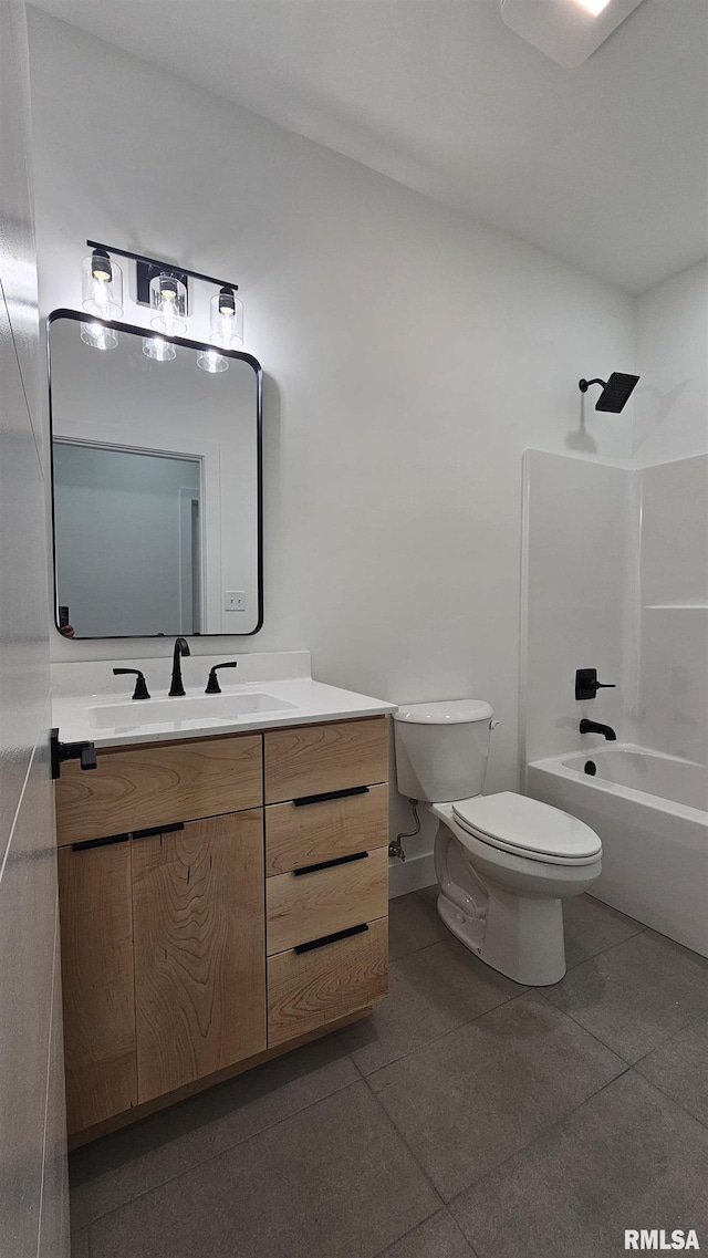809 N 27th St, Herrin, IL 62948 - bathroom with tile patterned floors, baseboards, toilet, shower / bathing tub combination, and vanity