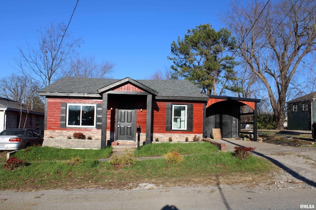 view of front facade with a carport