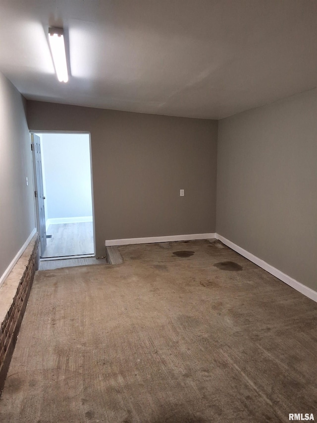 309 W 11th St, Metropolis, IL 62960 - unfurnished room with baseboards and carpet
