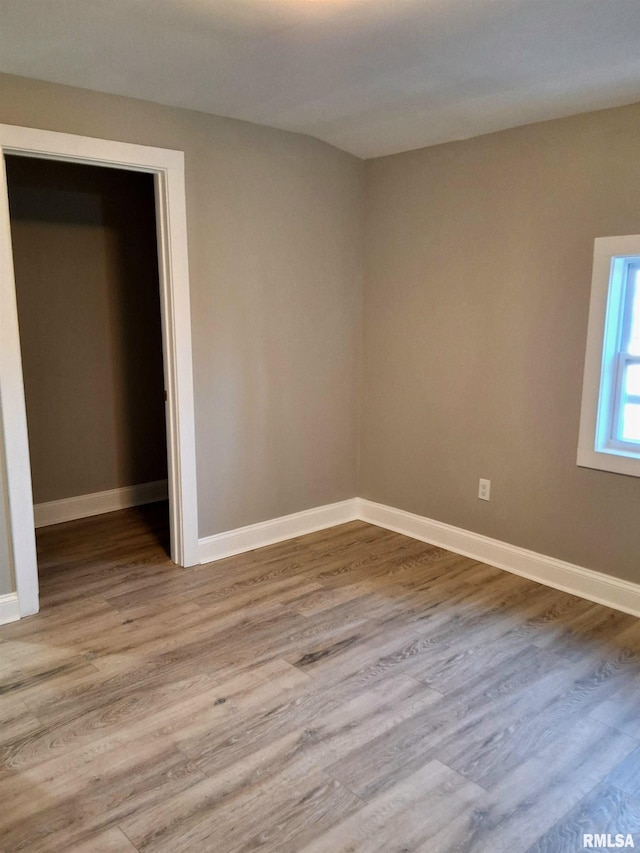 309 W 11th St, Metropolis, IL 62960 - spare room with baseboards and wood finished floors