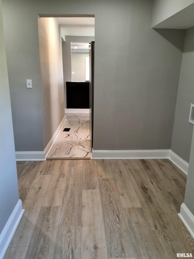 309 W 11th St, Metropolis, IL 62960 - interior space featuring baseboards and wood finished floors