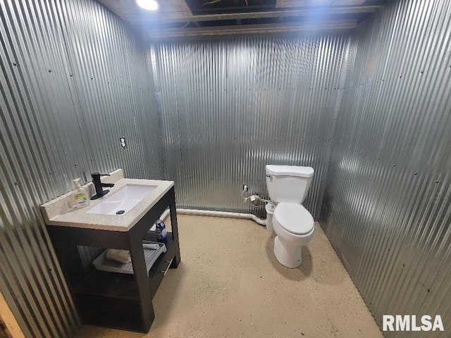 bathroom featuring toilet and sink