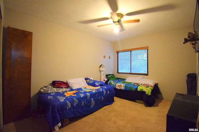 bedroom featuring carpet flooring and ceiling fan