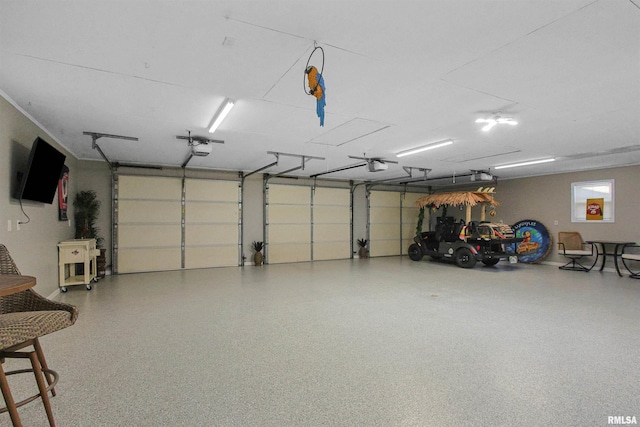 garage featuring a garage door opener