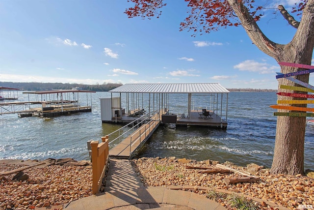 view of dock with a water view