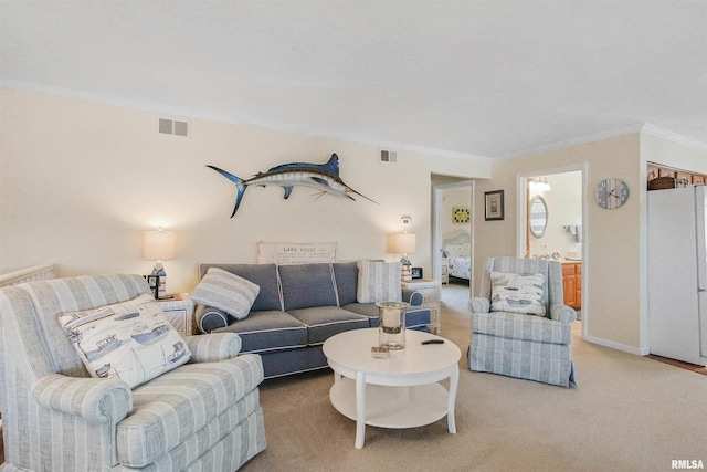 carpeted living room featuring ornamental molding