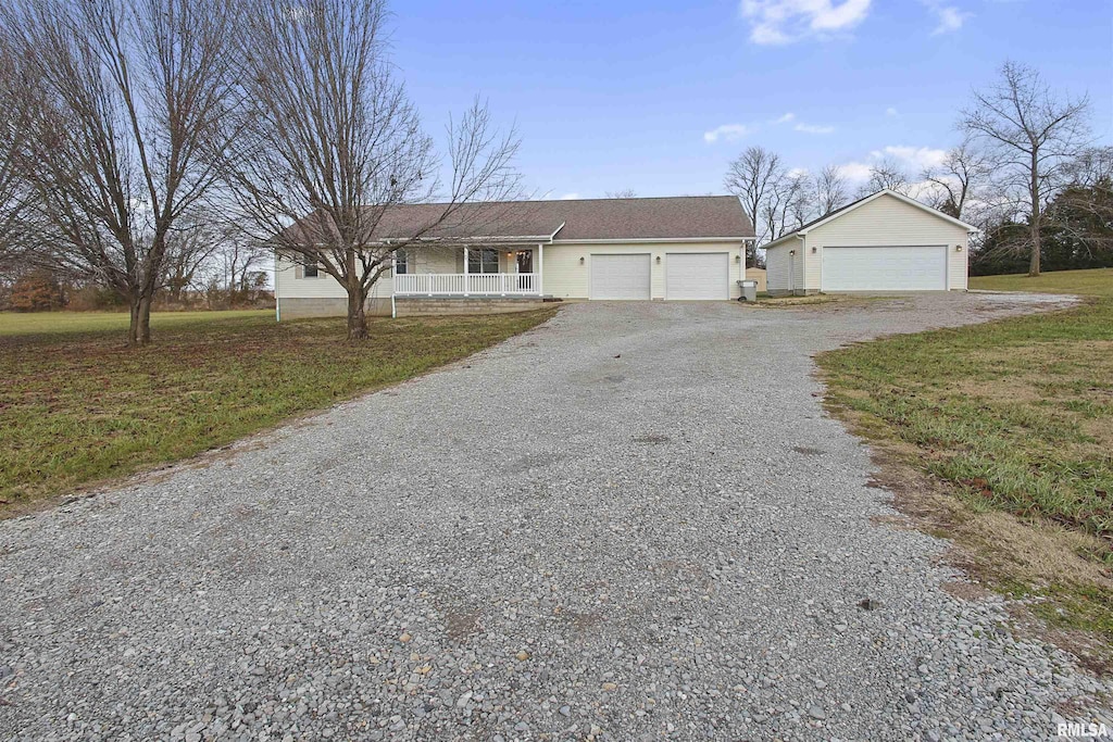 single story home with a front lawn and a garage