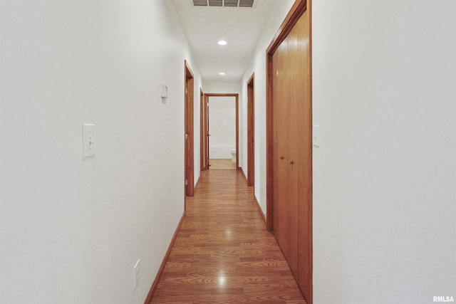 corridor featuring light wood-type flooring