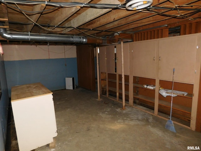 basement with refrigerator