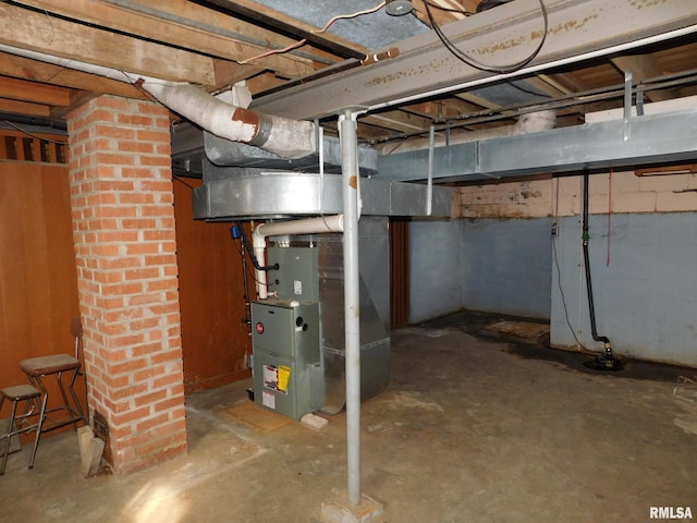 basement featuring heating unit