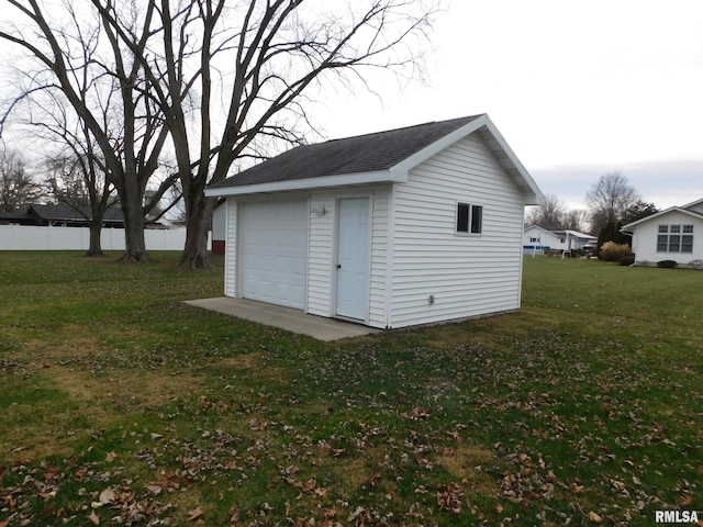 view of outbuilding with a lawn