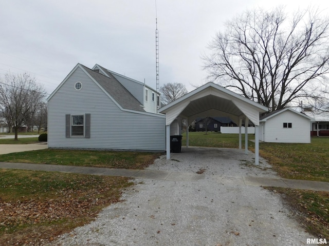 view of side of home featuring a carport