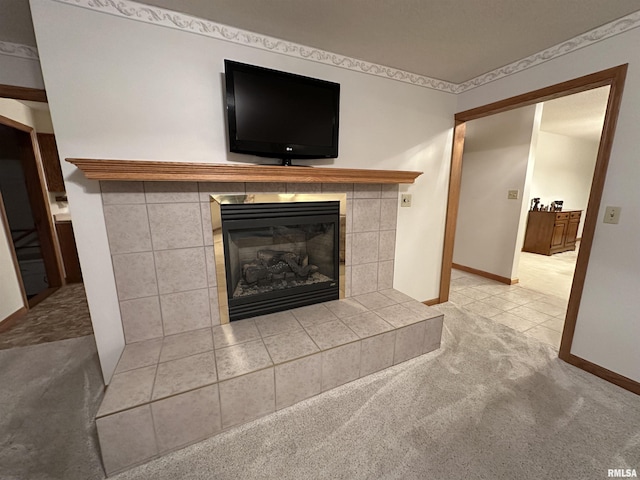 details featuring carpet flooring and a tile fireplace