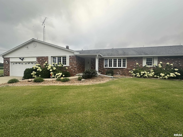 ranch-style home featuring a garage and a front lawn