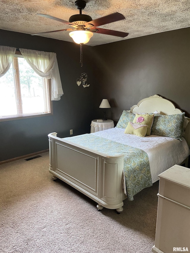 bedroom featuring carpet and ceiling fan