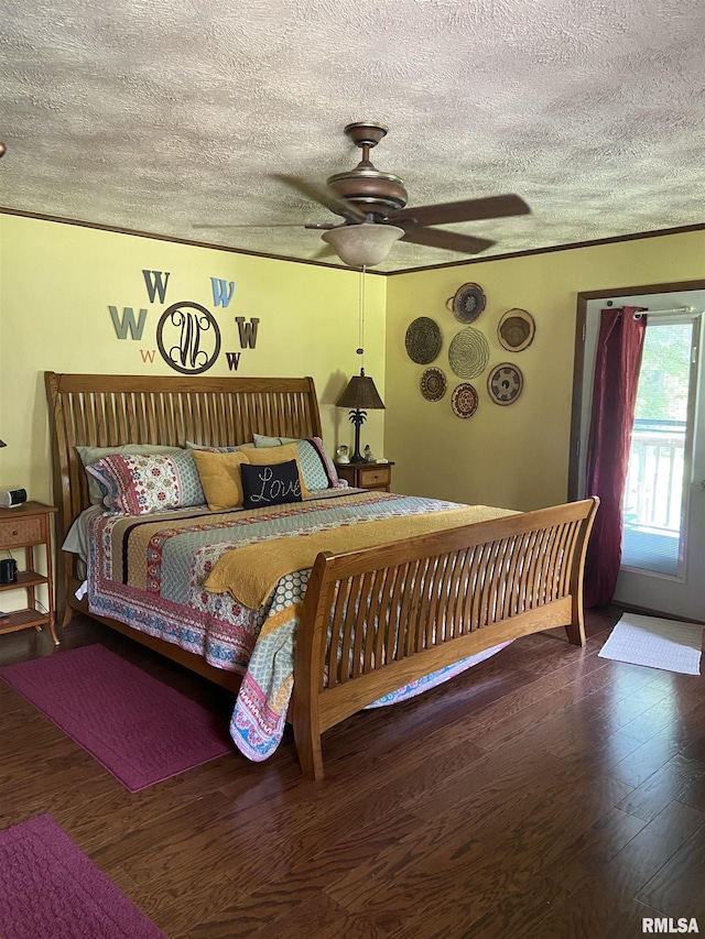 bedroom with ceiling fan and dark hardwood / wood-style flooring