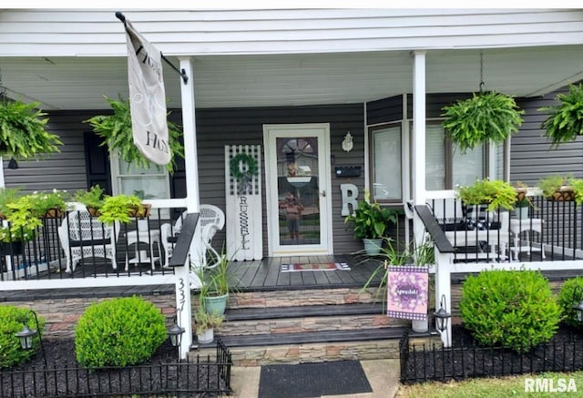 property entrance featuring covered porch