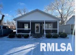 bungalow-style house featuring covered porch