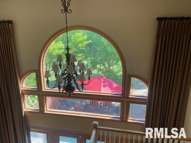 interior details with a chandelier