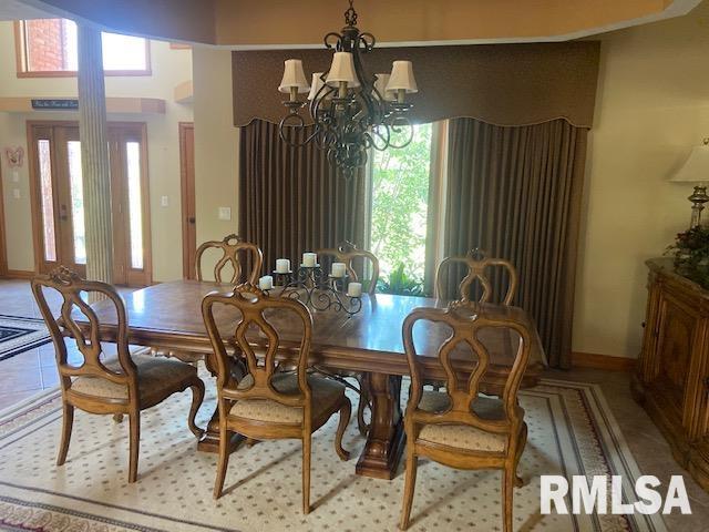 dining room with a chandelier