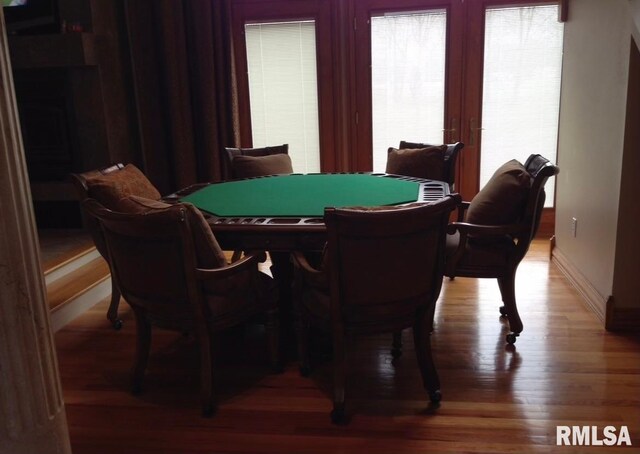 dining room with hardwood / wood-style flooring