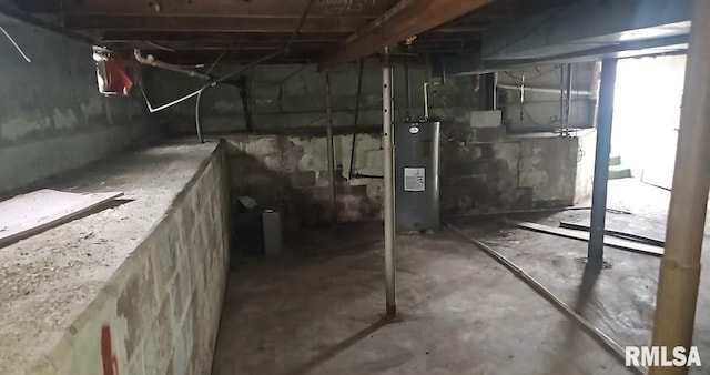 basement featuring electric water heater