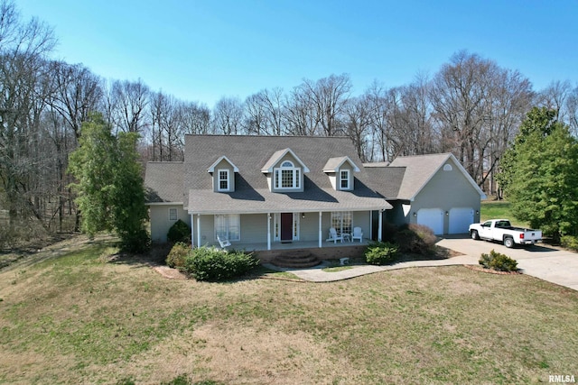 cape cod house featuring a front yard, an attached garage, covered porch, and concrete driveway