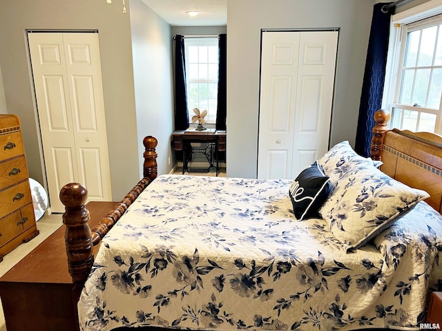 bedroom featuring two closets