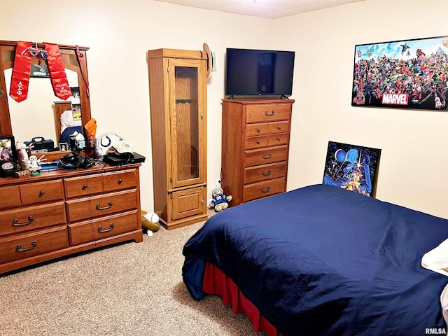 bedroom featuring carpet flooring