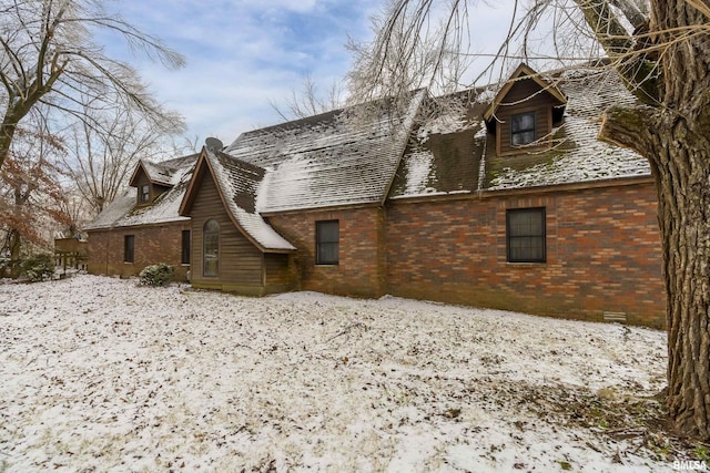 view of snow covered property