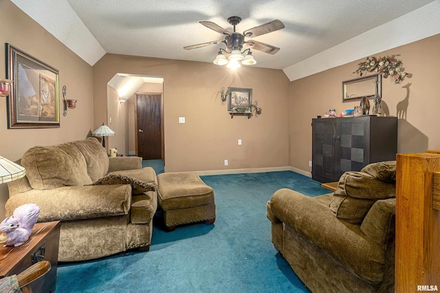 living room with dark colored carpet, ceiling fan, lofted ceiling, and a textured ceiling