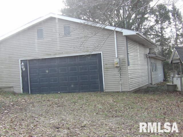 view of home's exterior featuring a garage