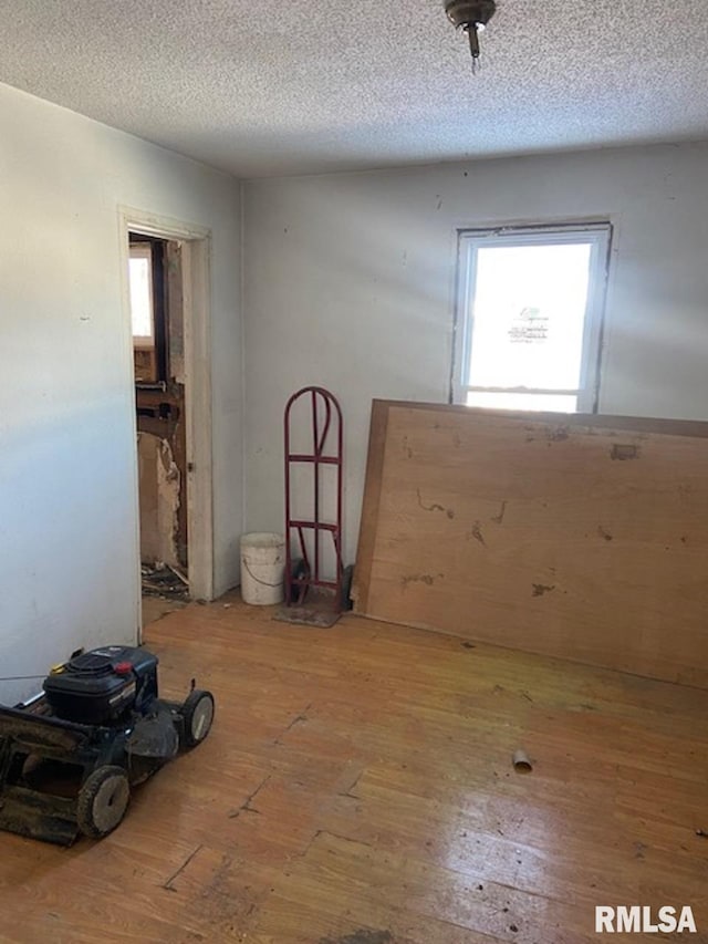 empty room featuring a textured ceiling