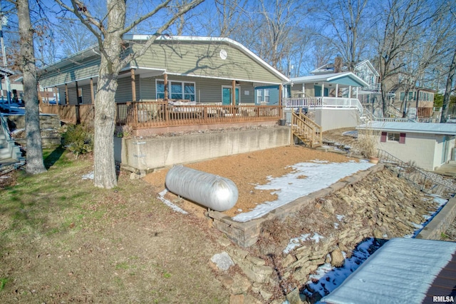 view of front of home with covered porch and driveway