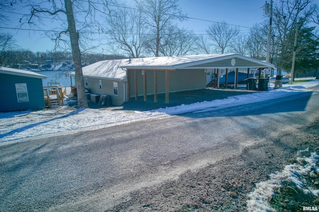 view of front of house featuring a carport