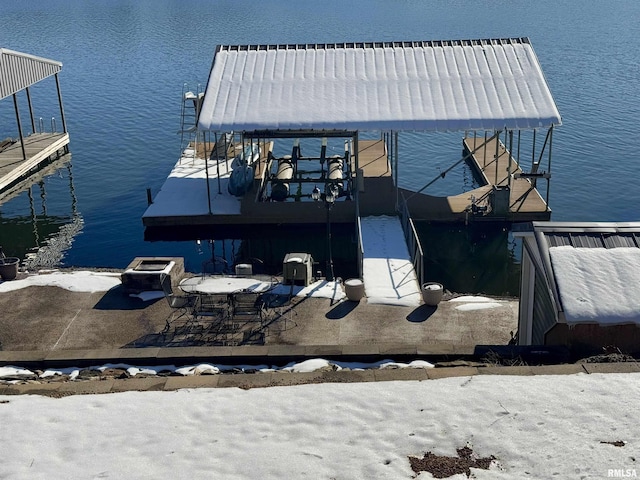 dock area featuring a water view