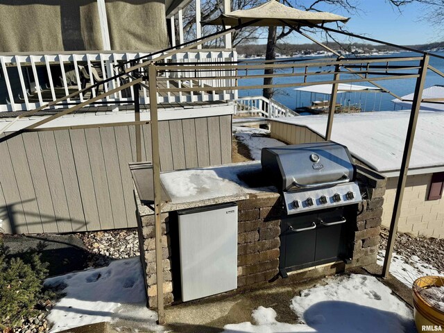 dock area featuring a water view