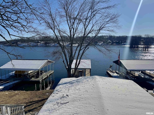 view of dock featuring a water view and boat lift