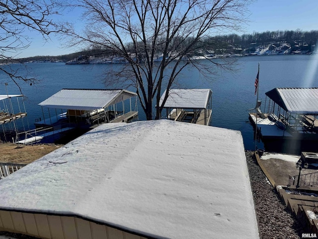 dock area featuring a water view and boat lift