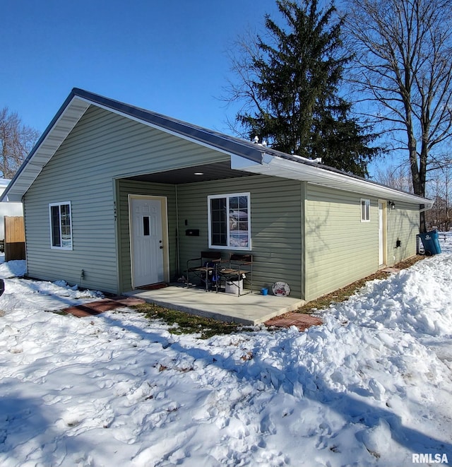 view of front of home featuring a patio