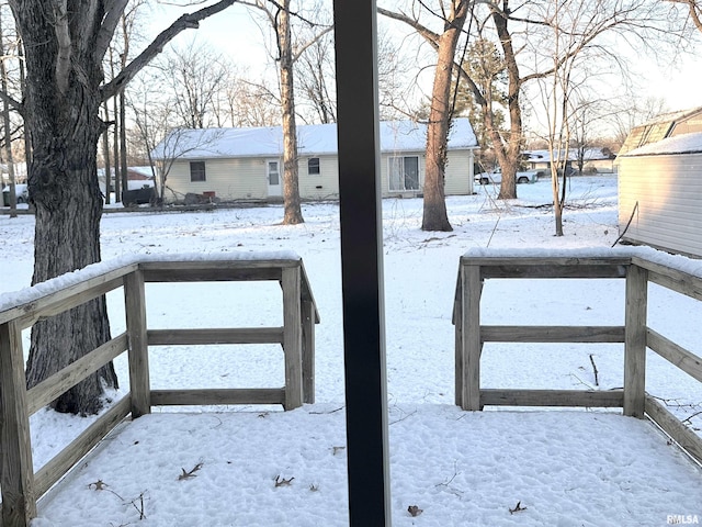 view of yard covered in snow